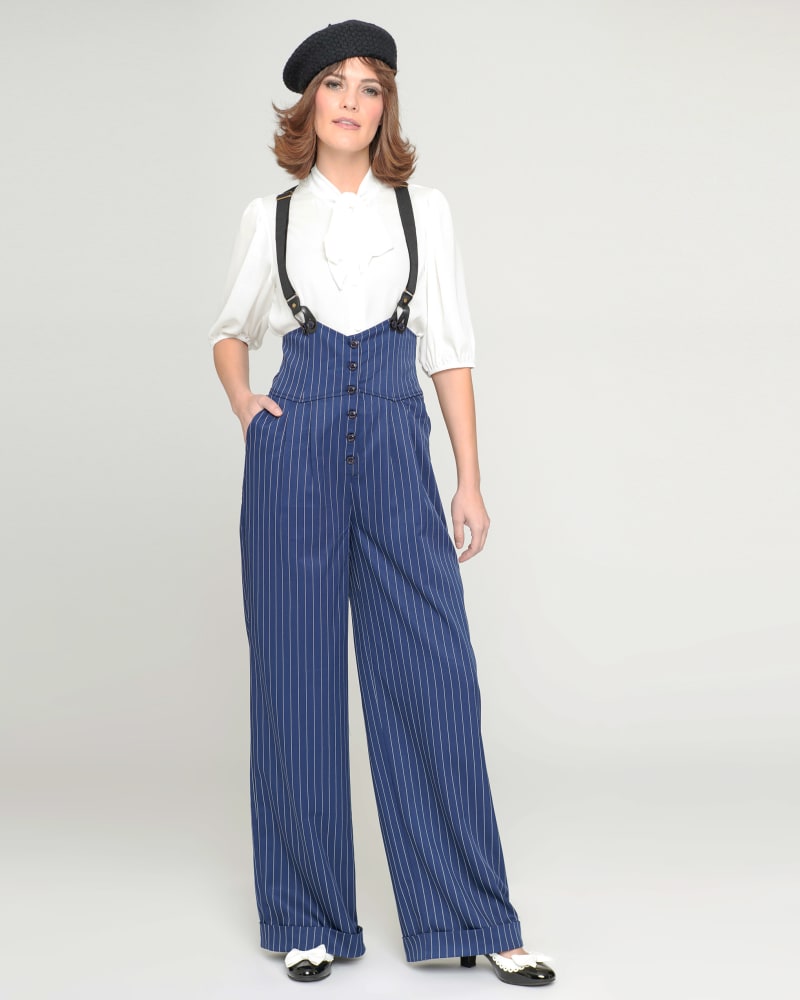 Front of a model wearing a size XL Unique Vintage Navy & White Pinstripe Thelma Suspender Pants in navy and white Stripes by Unique Vintage. | dia_product_style_image_id:329156